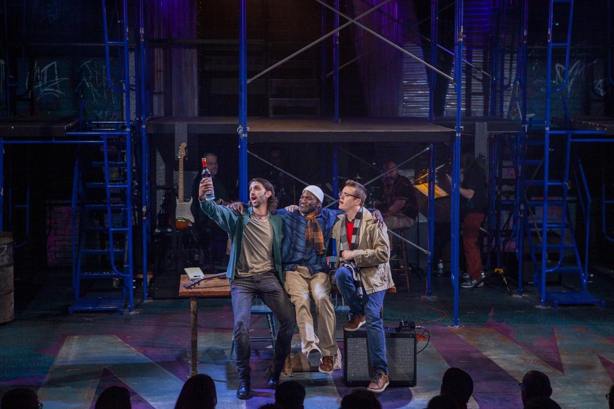 The company of Rent raising cups around a table